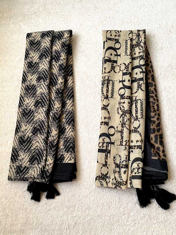 خرید شال جیر پک مشکی کرم طرح‌دار بسته ۱۰ عددی | فروش عمده شال با کیفیت بالا
